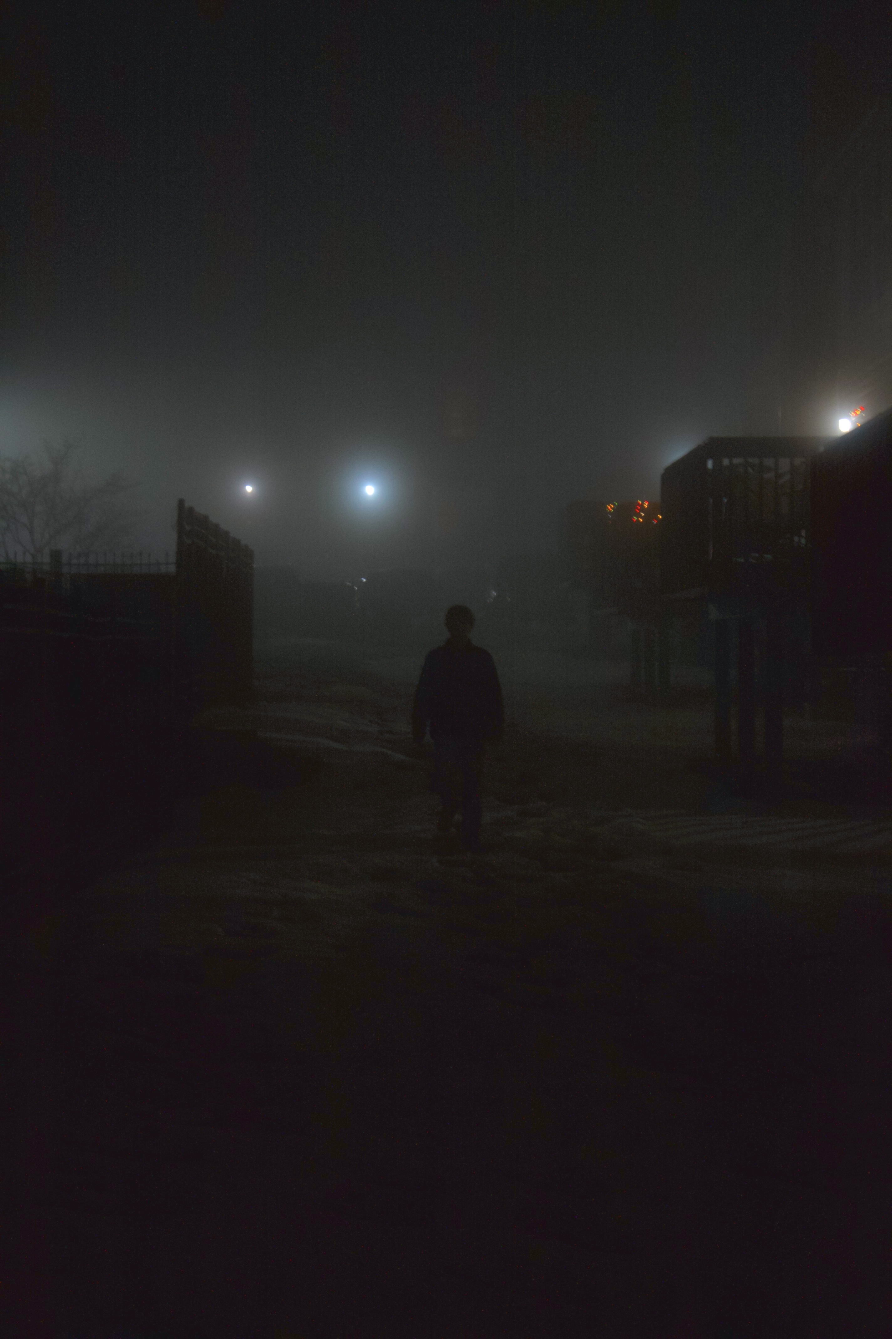 eerie standing in the alley