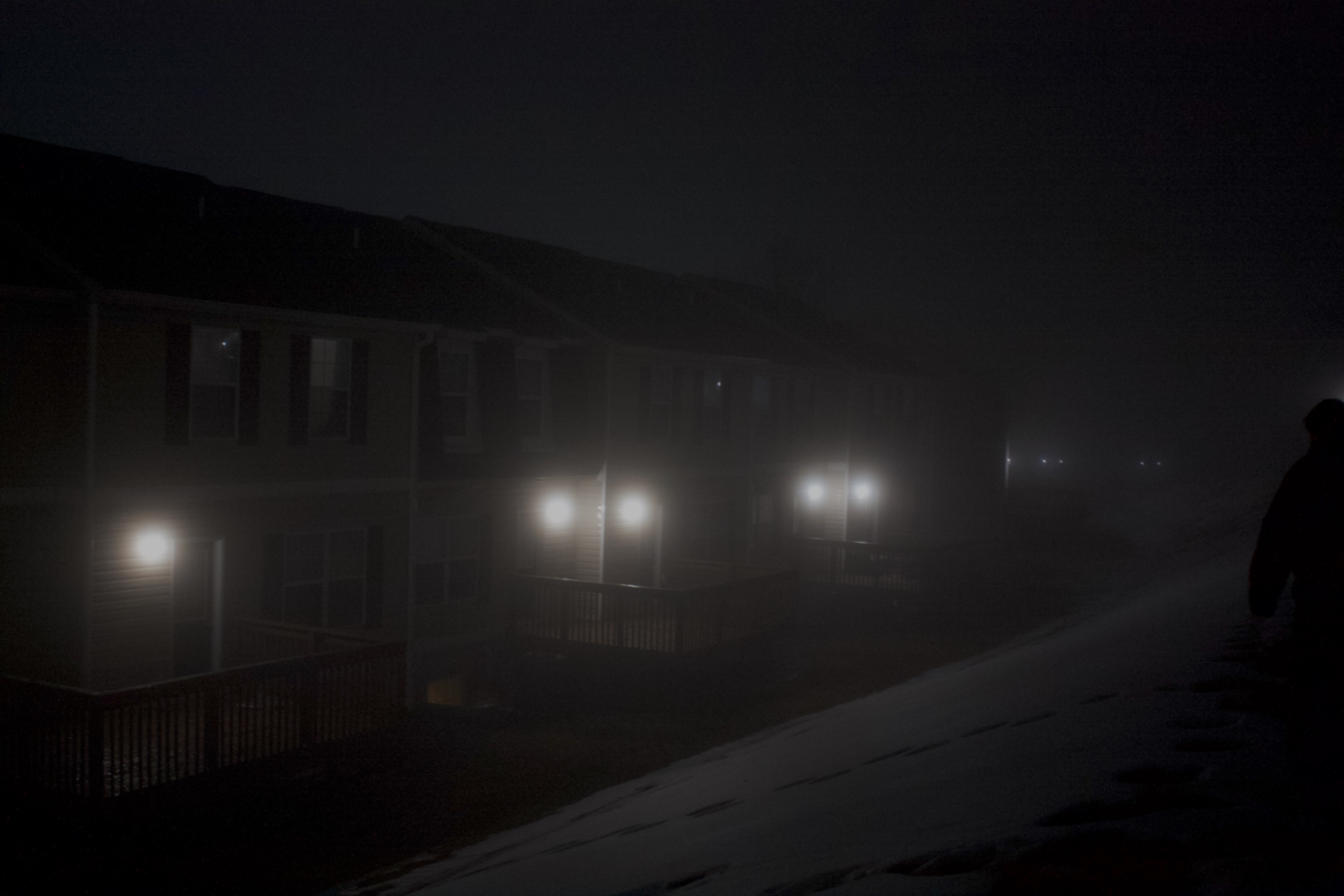 back porches with lamps on